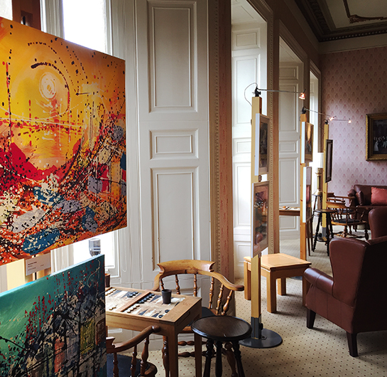 An artists group display their work in The Clifton Club in Clifton, Bristol with Art Posts